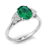 9ct White Gold Diamond Cluster and Oval Emerald Ring